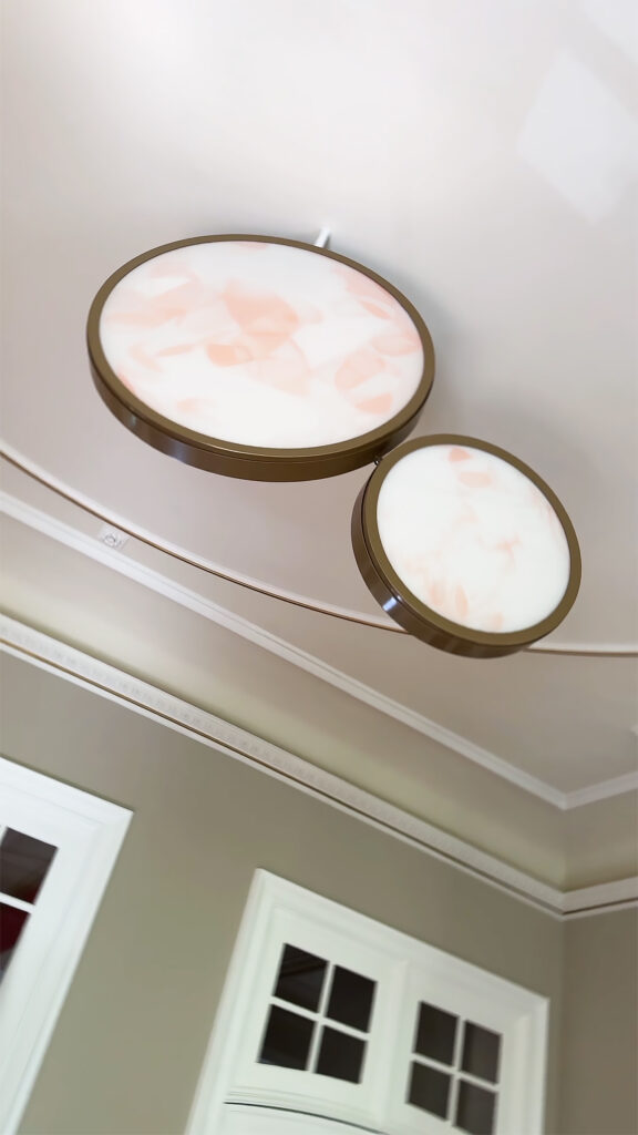 Lighting: pendant light design by Guillaume Bottazzi, made up of enamels